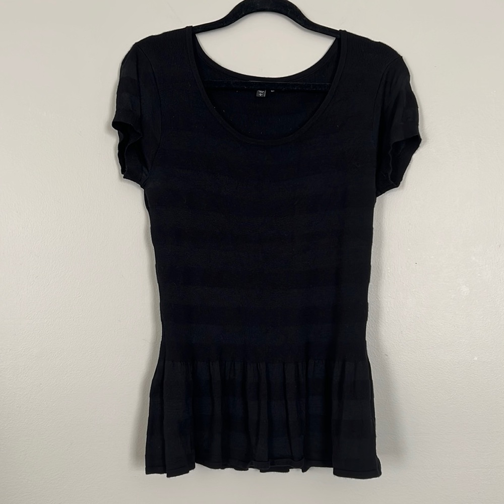Black peplum Express top
